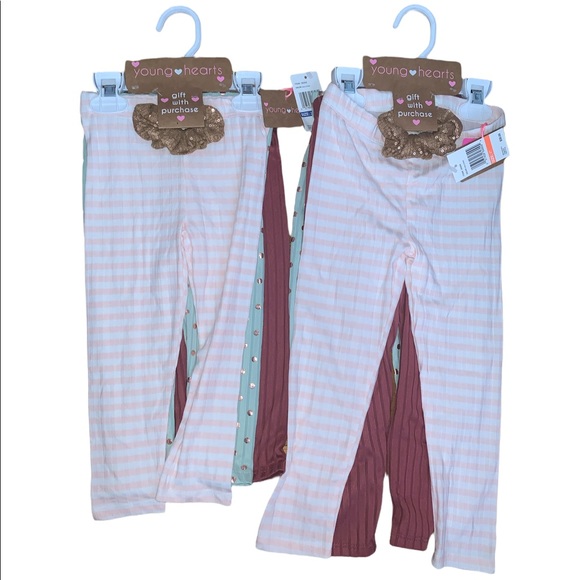 3 pair of leggings with a hair tie - Picture 2 of 5